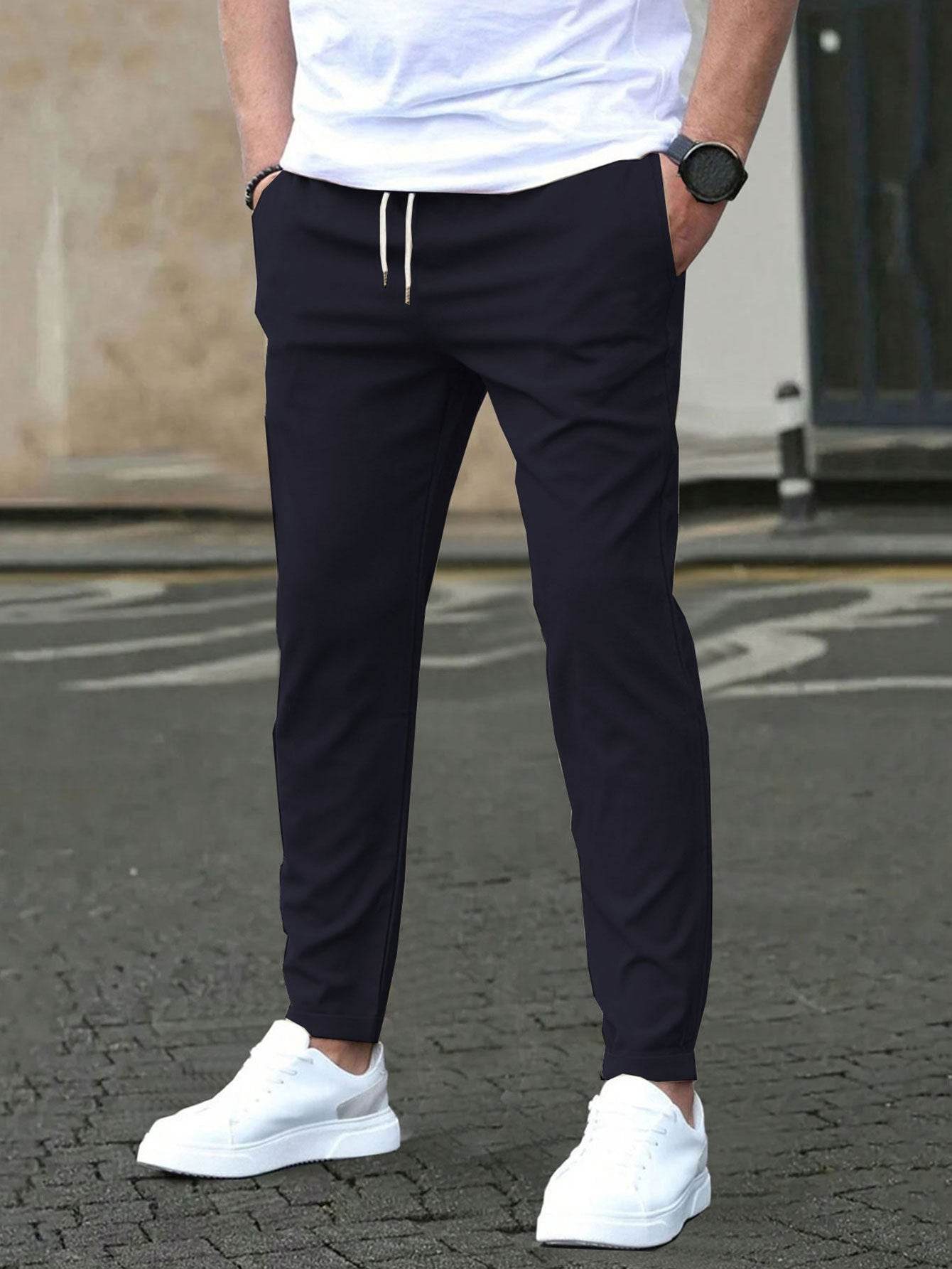 Pantalon court décontracté coupe slim avec étiquette en cuir, couleur unie - Droxev