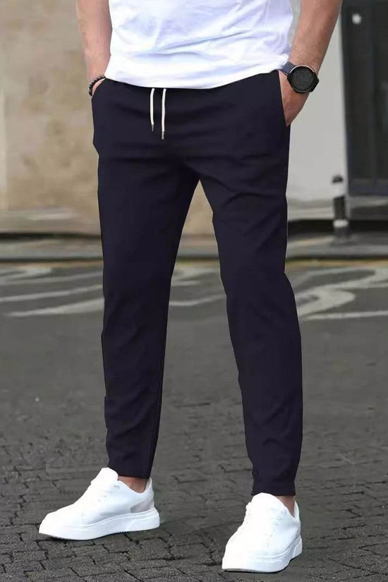 Pantalon court décontracté coupe slim avec étiquette en cuir, couleur unie - Droxev