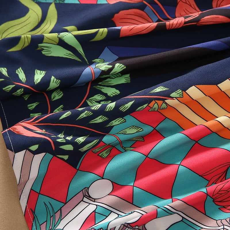 Robe imprimée verte avec ourlet plissé