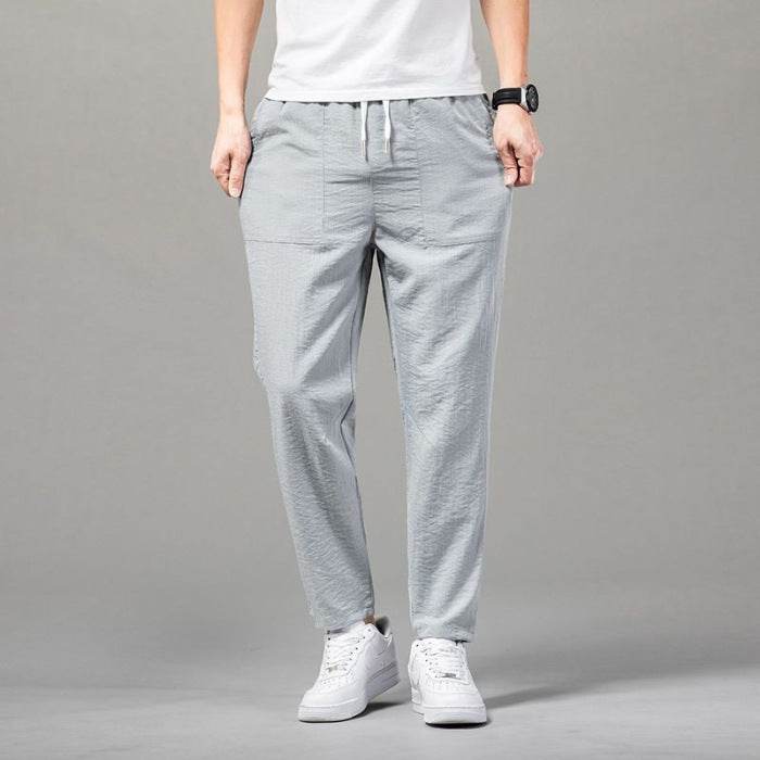 Pantalon fin de couleur unie pour homme, version épurée - Droxev