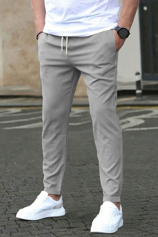 Pantalon court décontracté coupe slim avec étiquette en cuir, couleur unie - Droxev