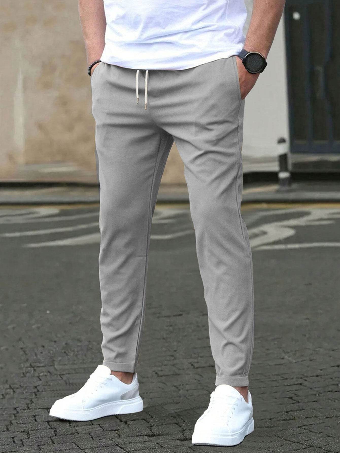 Pantalon court décontracté coupe slim avec étiquette en cuir, couleur unie - Droxev