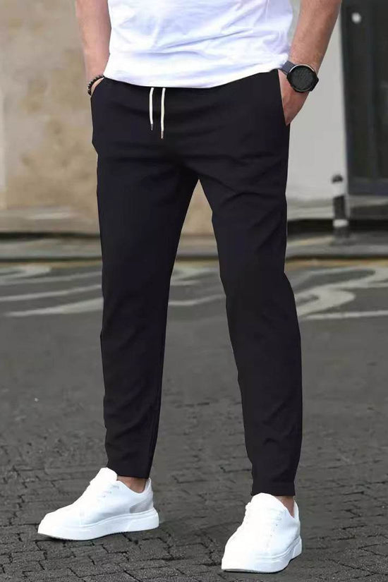 Pantalon court décontracté coupe slim avec étiquette en cuir, couleur unie - Droxev