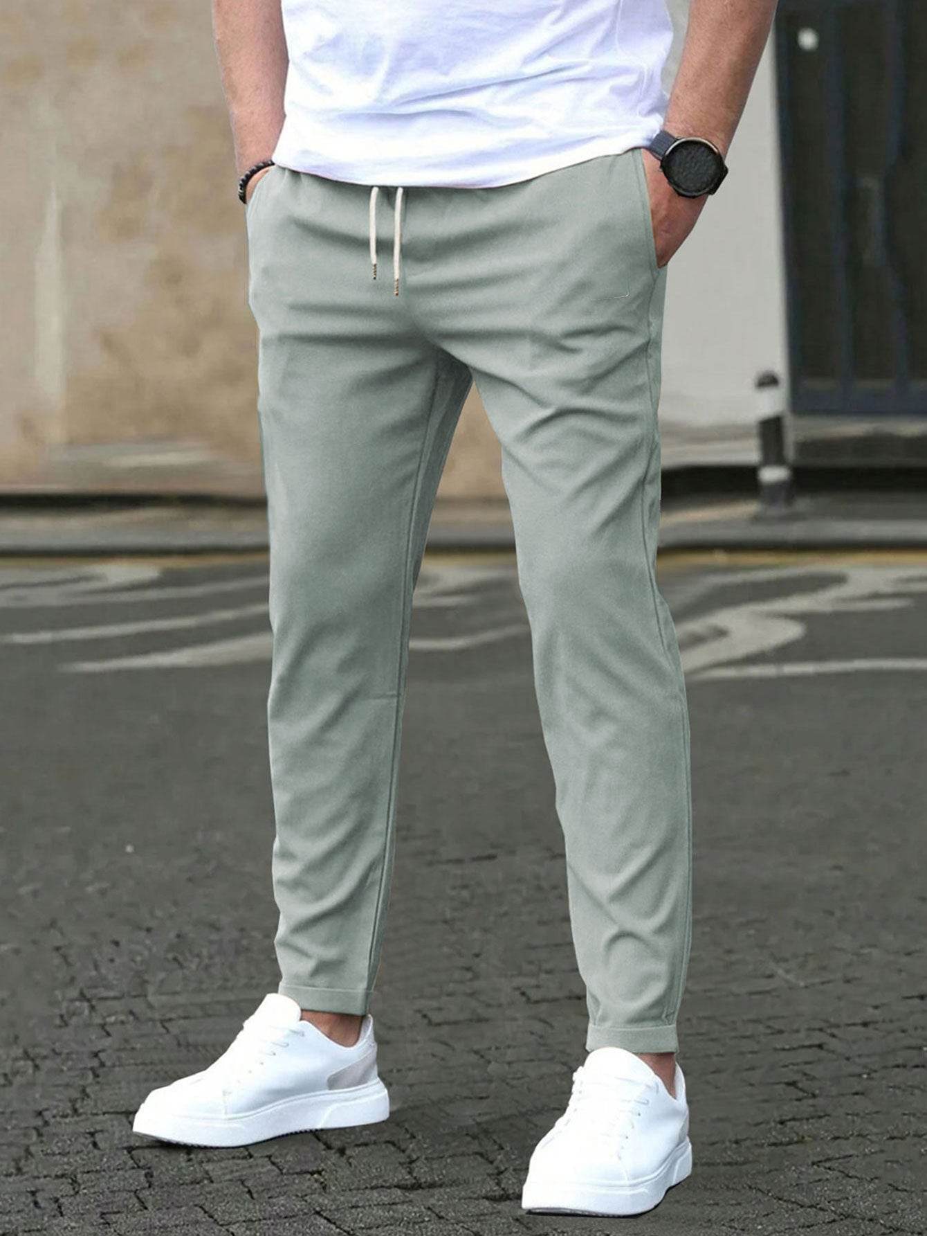 Pantalon court décontracté coupe slim avec étiquette en cuir, couleur unie - Droxev