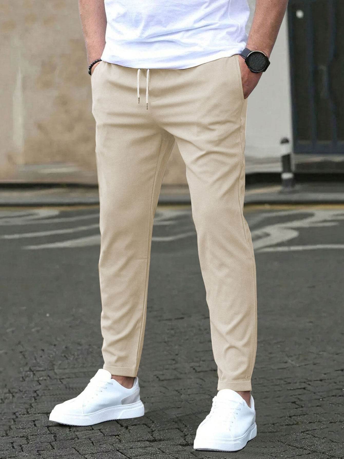 Pantalon court décontracté coupe slim avec étiquette en cuir, couleur unie - Droxev